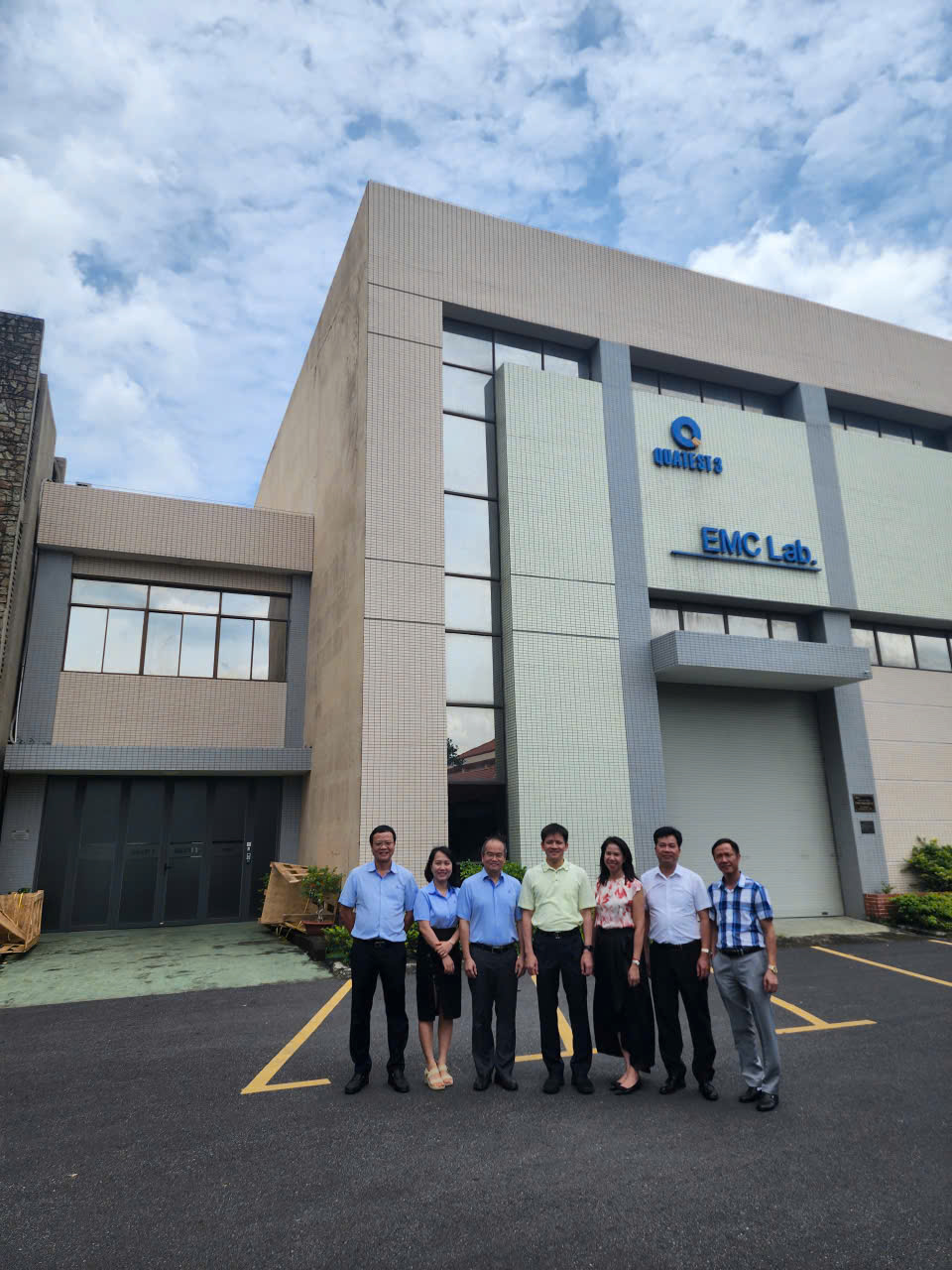 A group of people standing in front of a buildingAI-generated content may be incorrect.