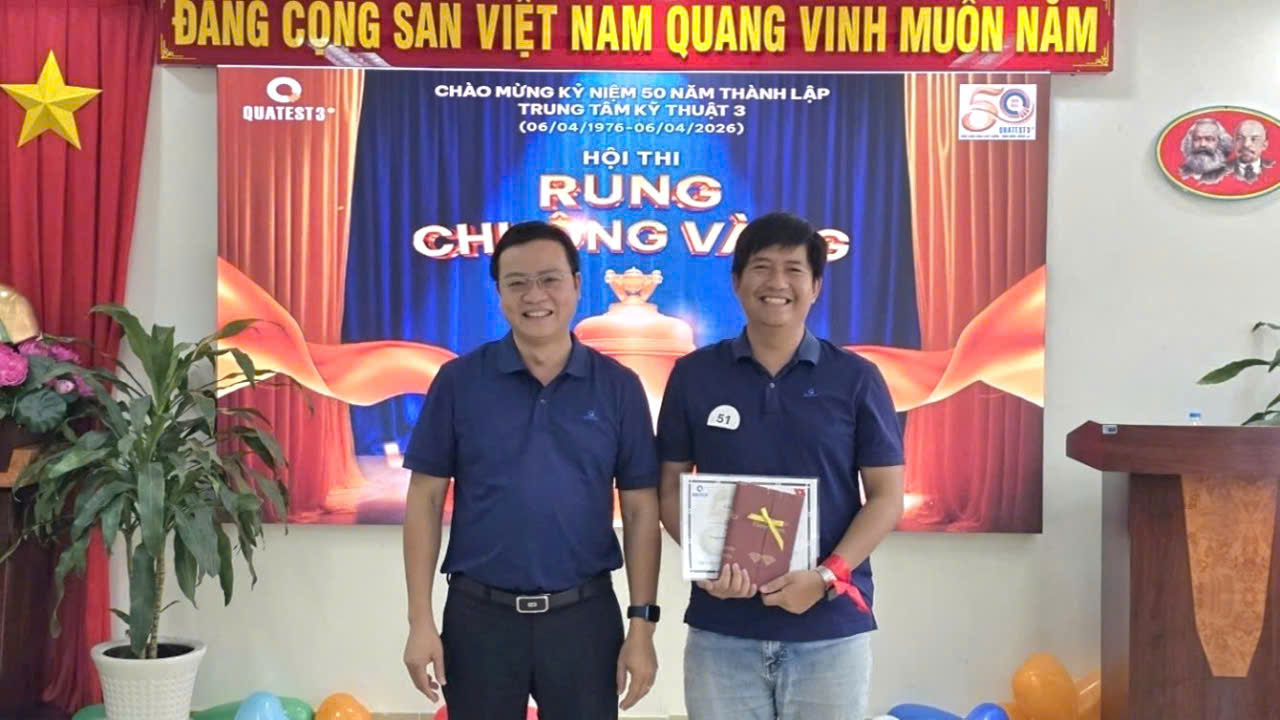 Two men standing in front of a stageAI-generated content may be incorrect.