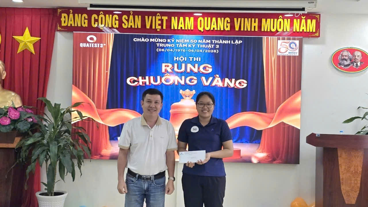 Two men standing in front of a bannerAI-generated content may be incorrect.